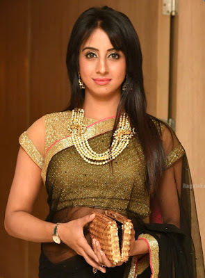 Hot golden blouse Sanjjanaa wearing black transparent saree